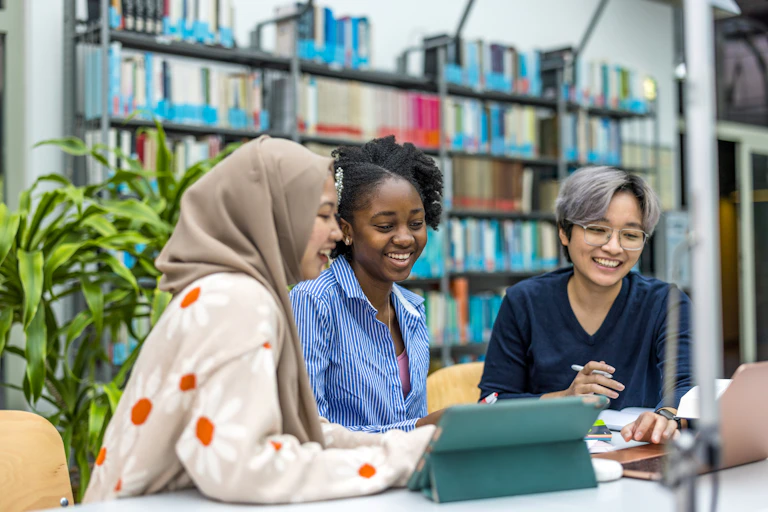 Students working together in library