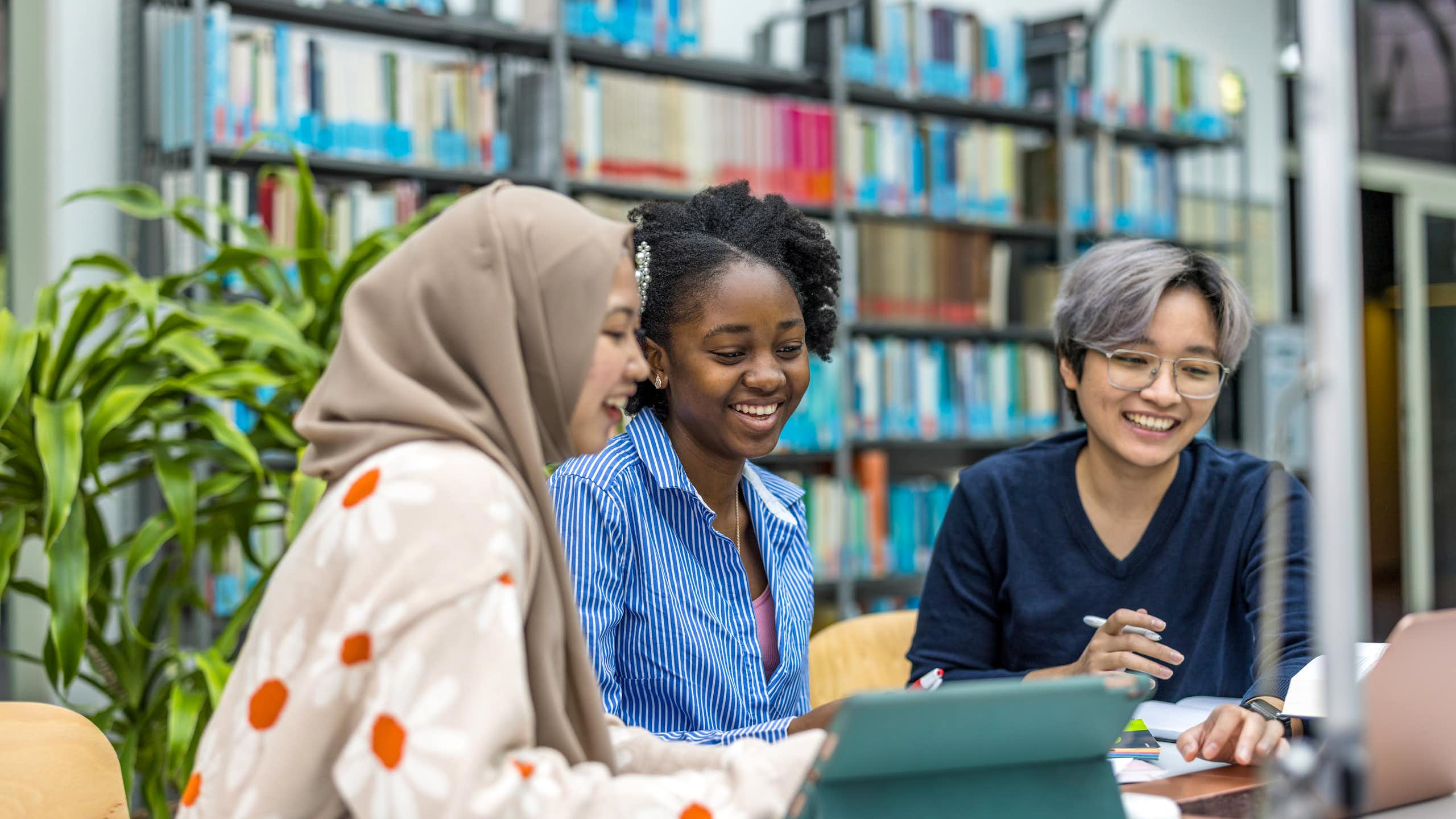 Students working together in library