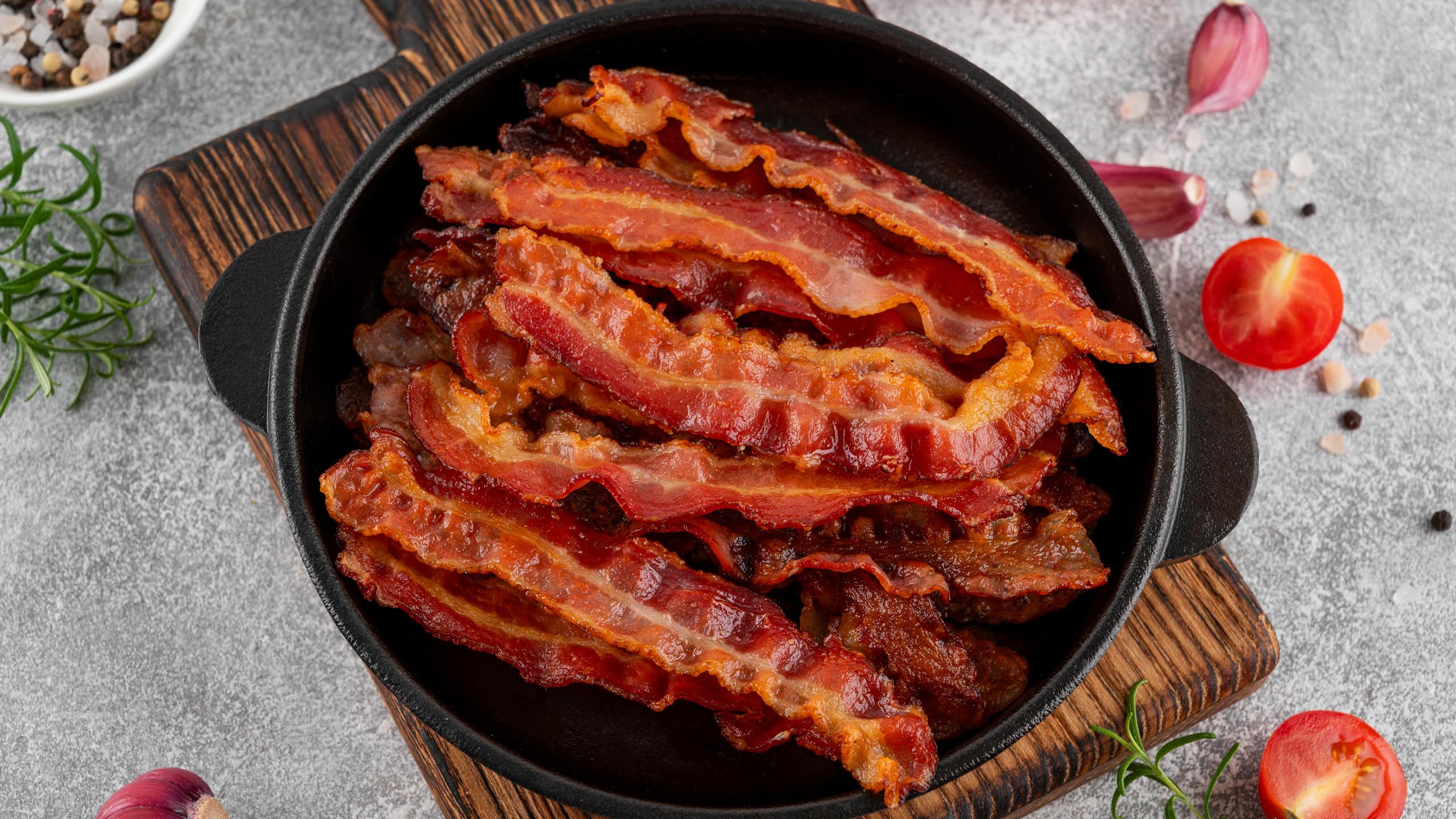 pan of crispy bacon on kitchen surface