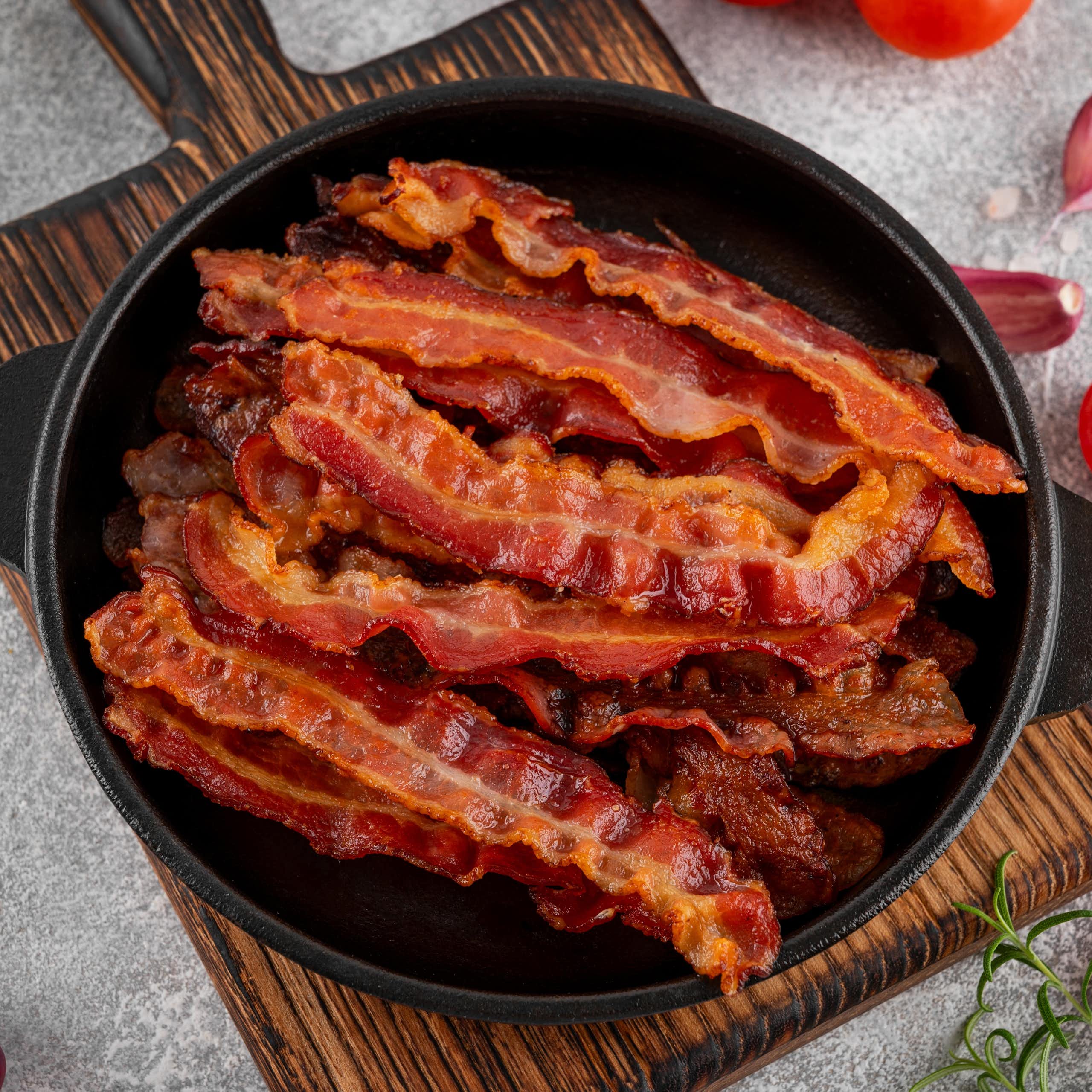 pan of crispy bacon on kitchen surface