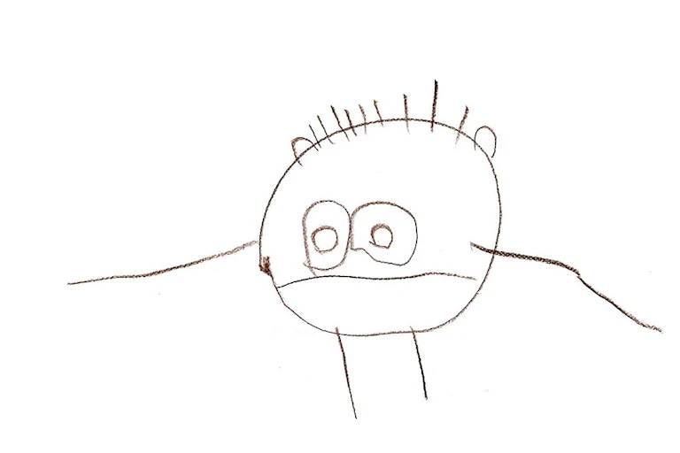 Child's drawing of a head with arms and legs