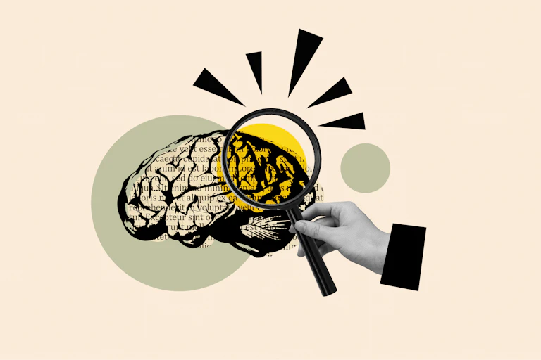 Ilustración de una lupa examinando un cerebro.