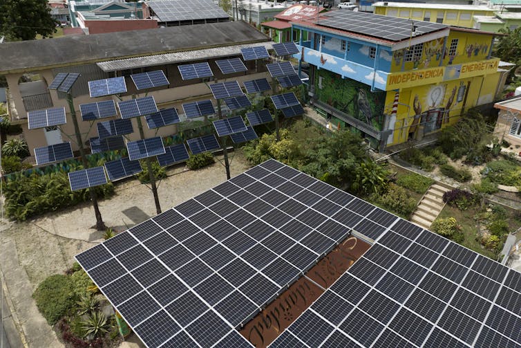 Solar panels on roofs and apartment balconies