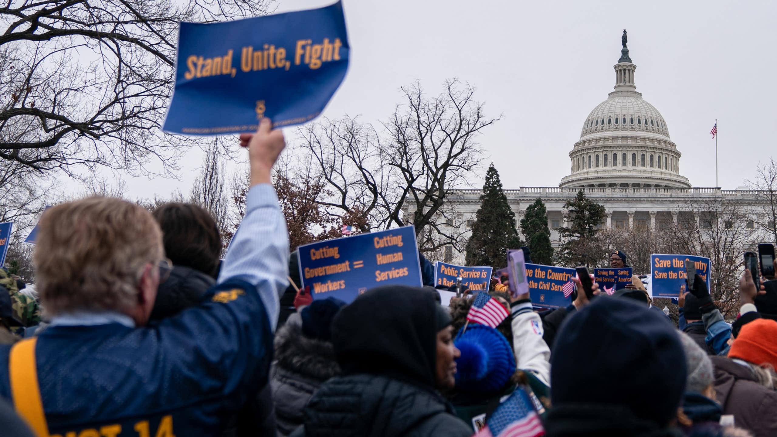 People participate in a protest outside the U.S. Capitol.