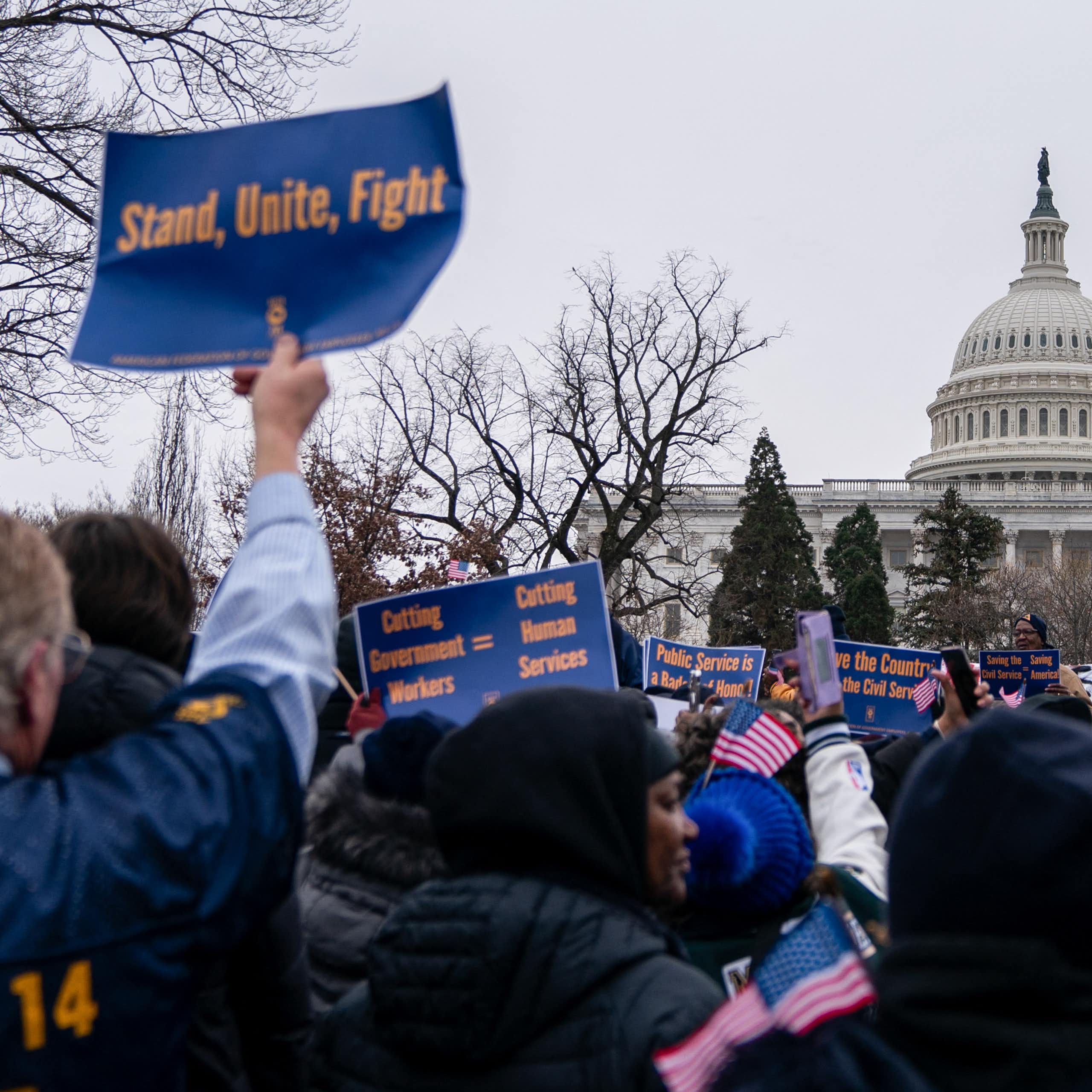 People participate in a protest outside the U.S. Capitol.
