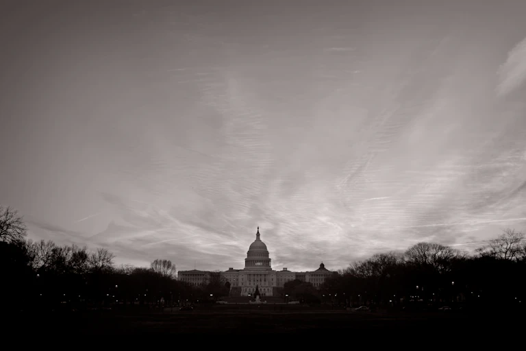 The US Capitol on a dark, gray day.
