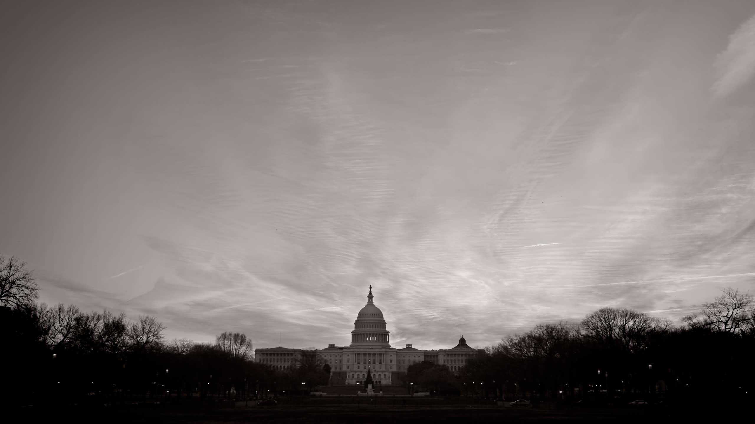 The US Capitol on a dark, gray day.