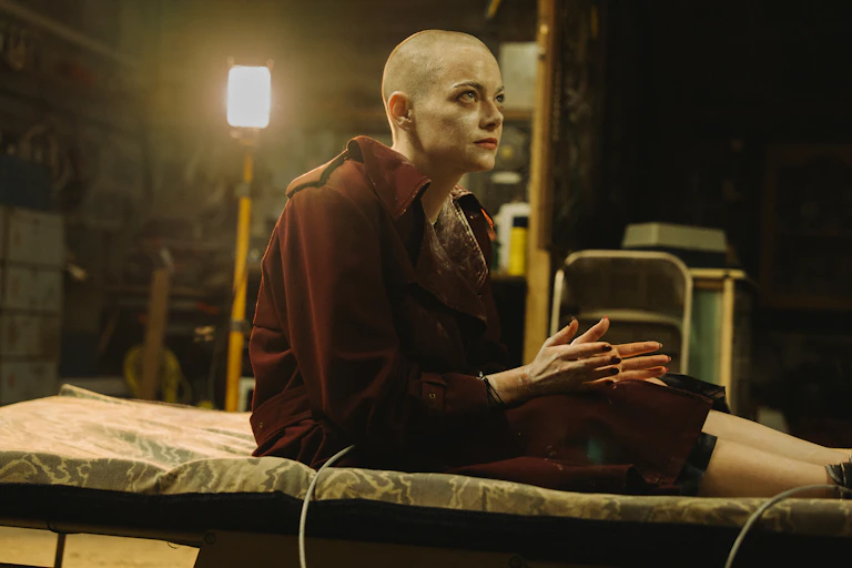 Emma Stone as bald-headed CEO Michelle