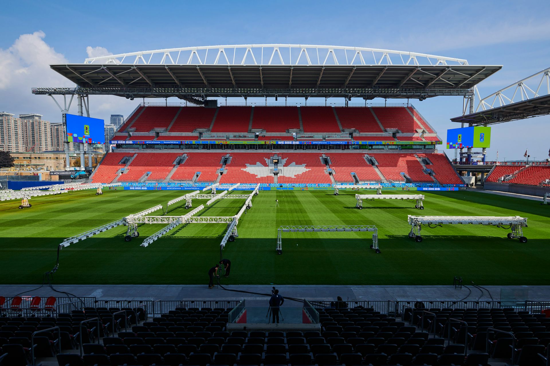 A wide shot of a professional soccer field from the stands