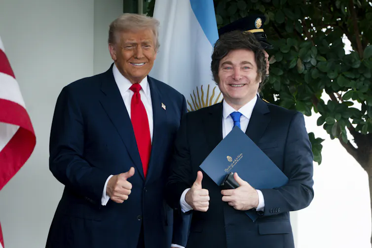 donald trump and javier milei meet at the white house and give thumbs up to photographers