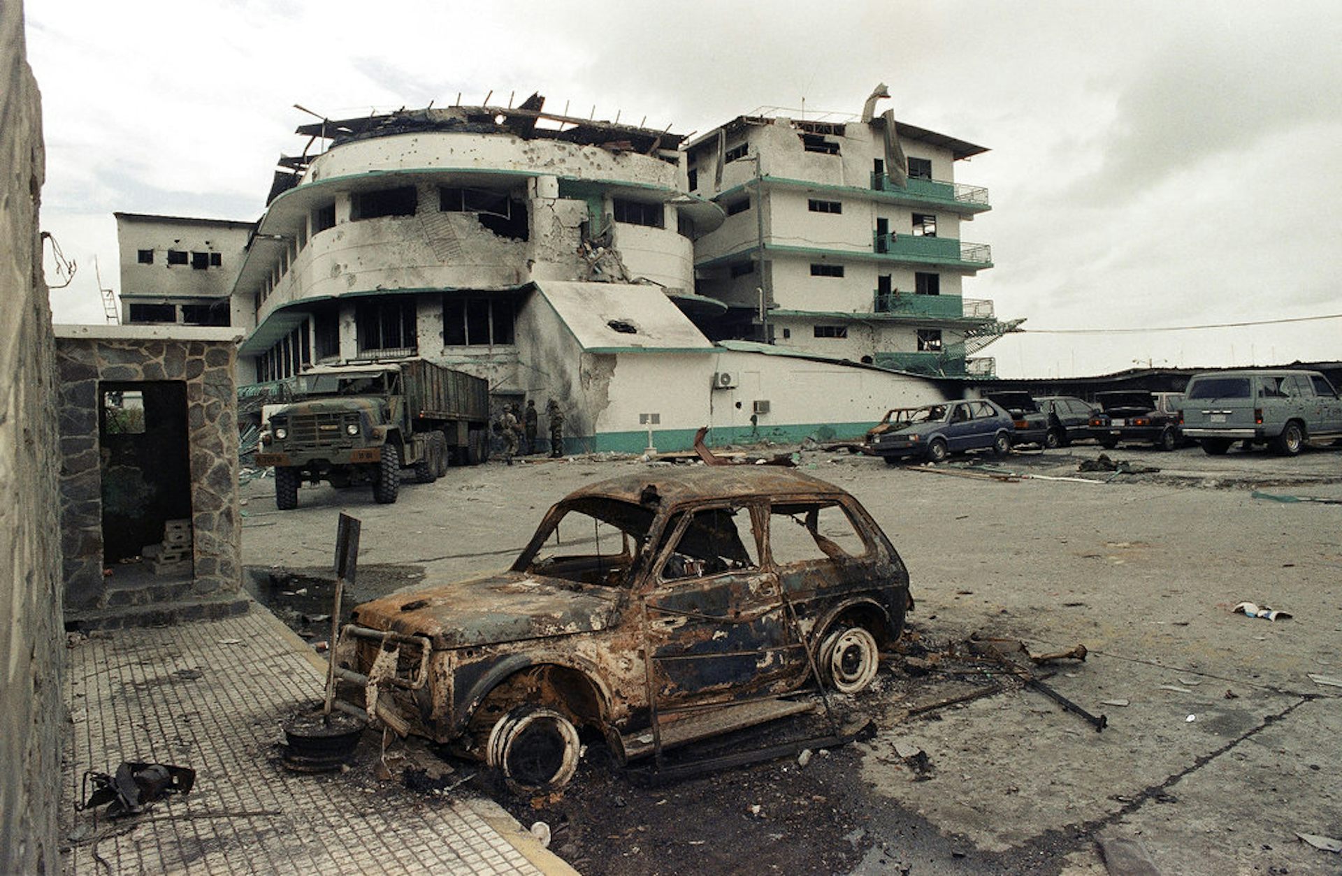 A photo of a bombed out vehicle.