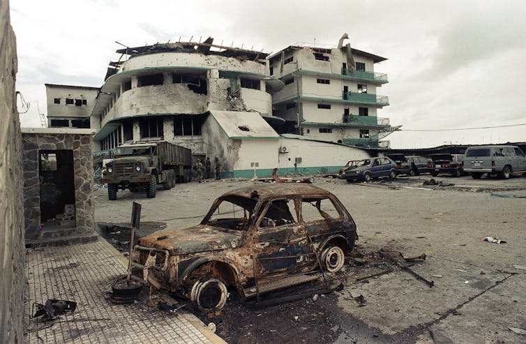 Trump’s squeeze of Venezuela is going past ‘Monroe doctrine’ – in ideology, intent and scale, it’s unparalleled 2 A photo of a bombed out vehicle.