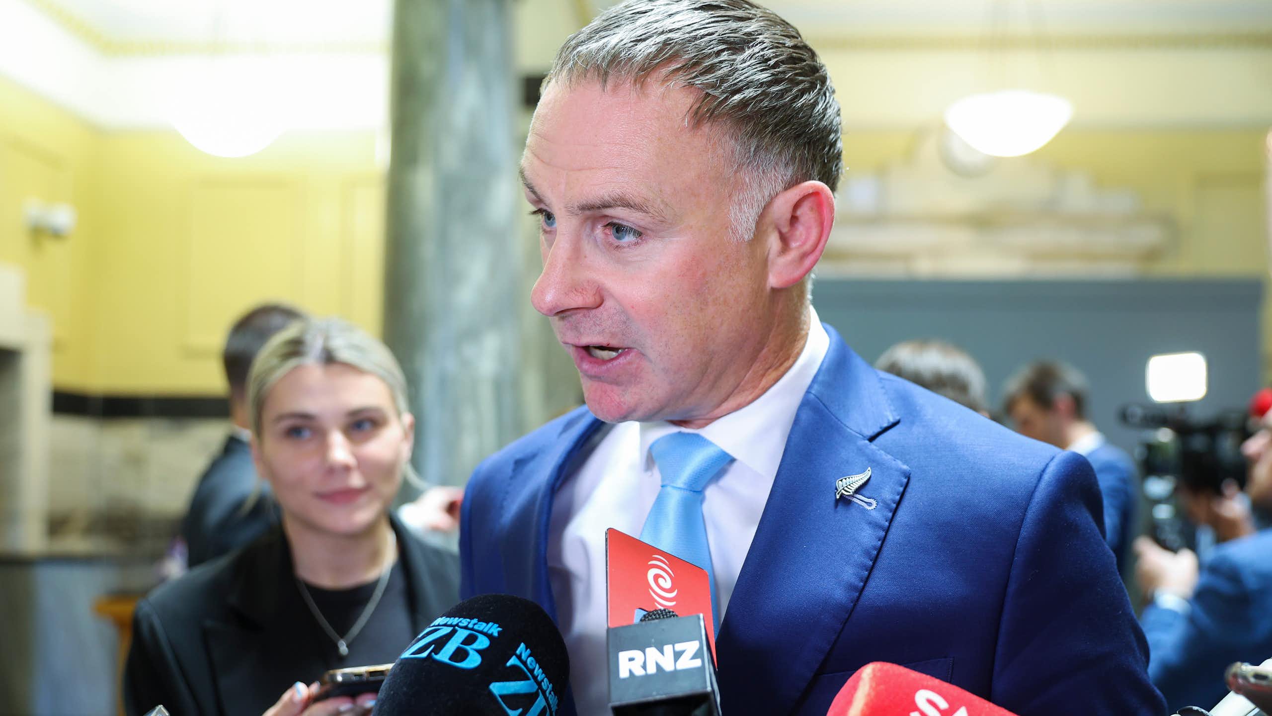 Climate change minister Simon Watts at a media briefing.