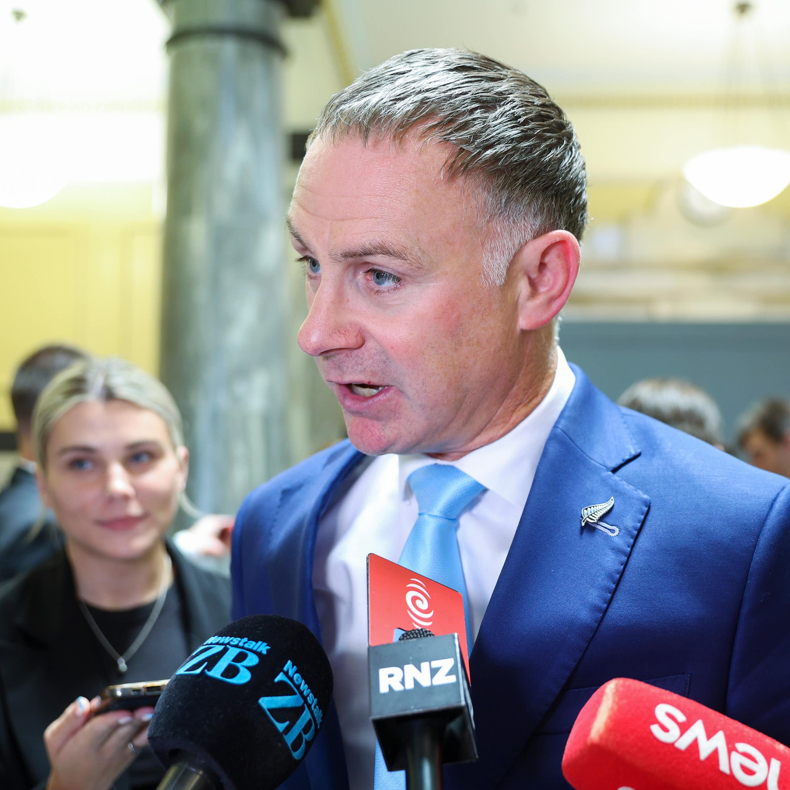 Climate change minister Simon Watts at a media briefing.