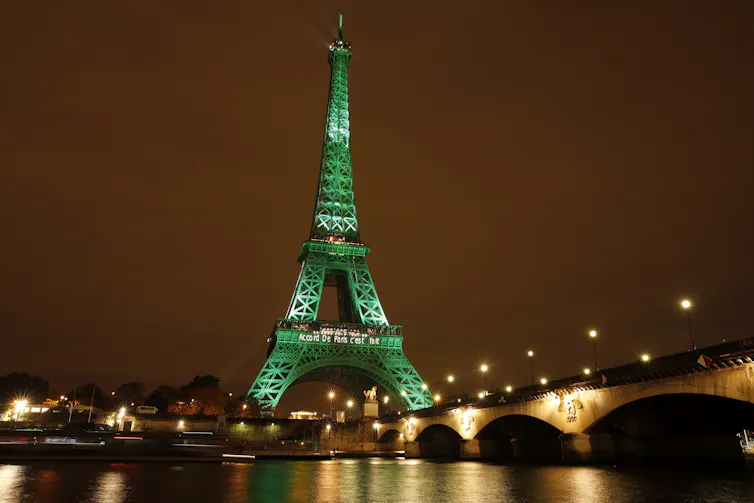 Eiffel Tower illuminated in green