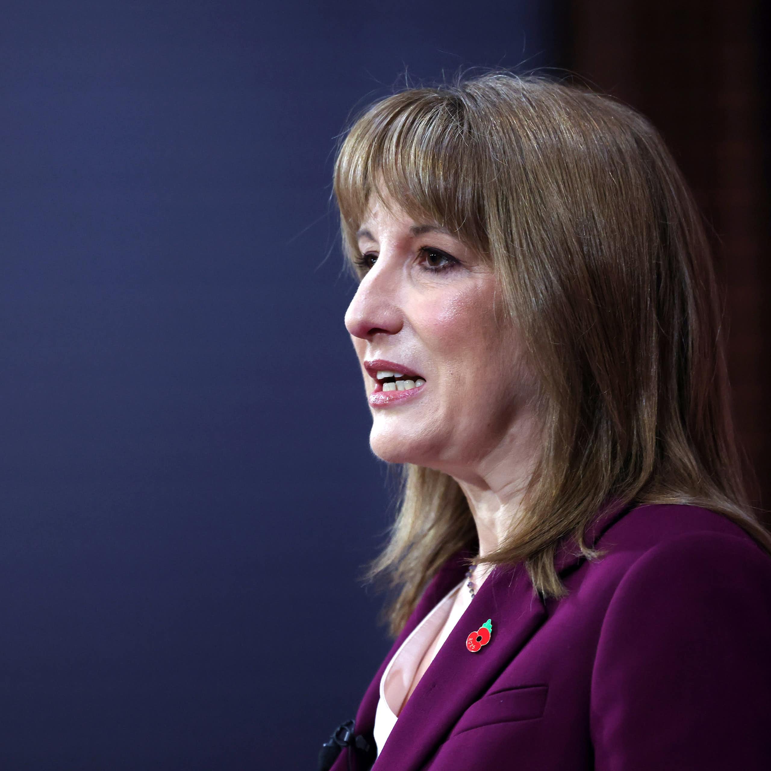 uk chancellor rachel reeves delivering a speech at downing street.