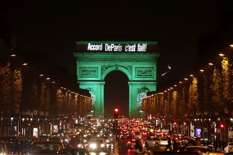 The Arc de Triomphe illuminated in green