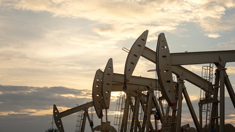 line of nodding donkey oil pumps