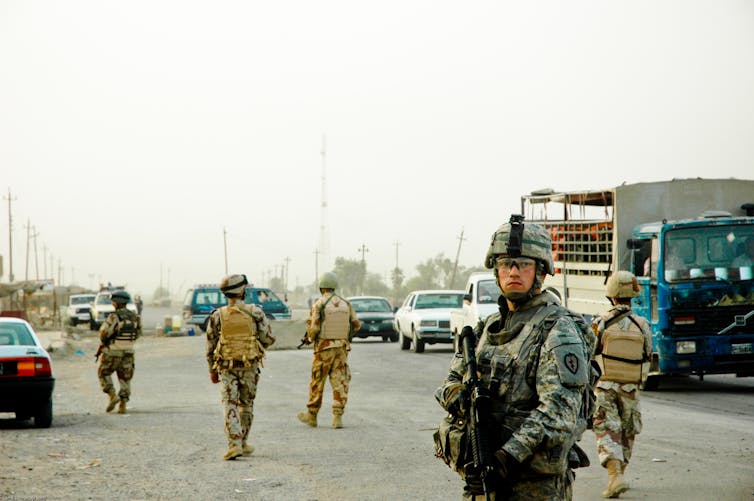 American soldiers on patrol in Taji, Iraq.