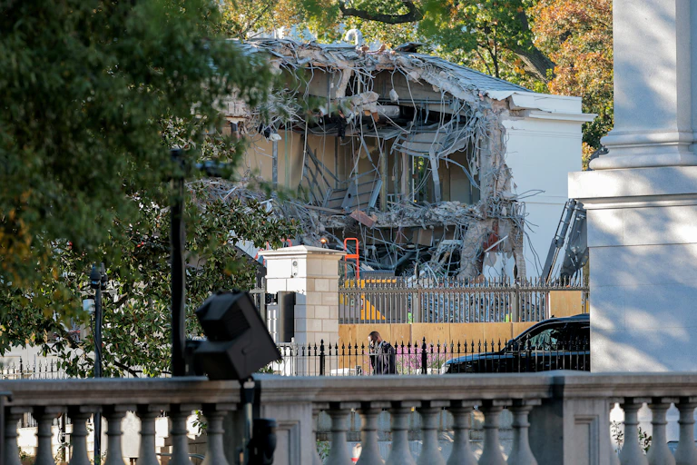 Part of the White House is demolished.