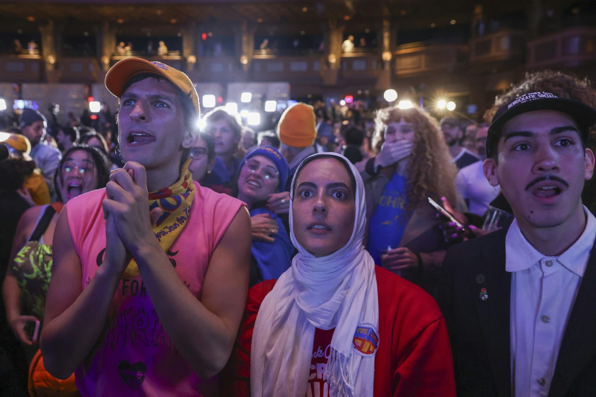 Supporters of Zohran Mamdani watch as the results of the New York City mayoral election are called.
