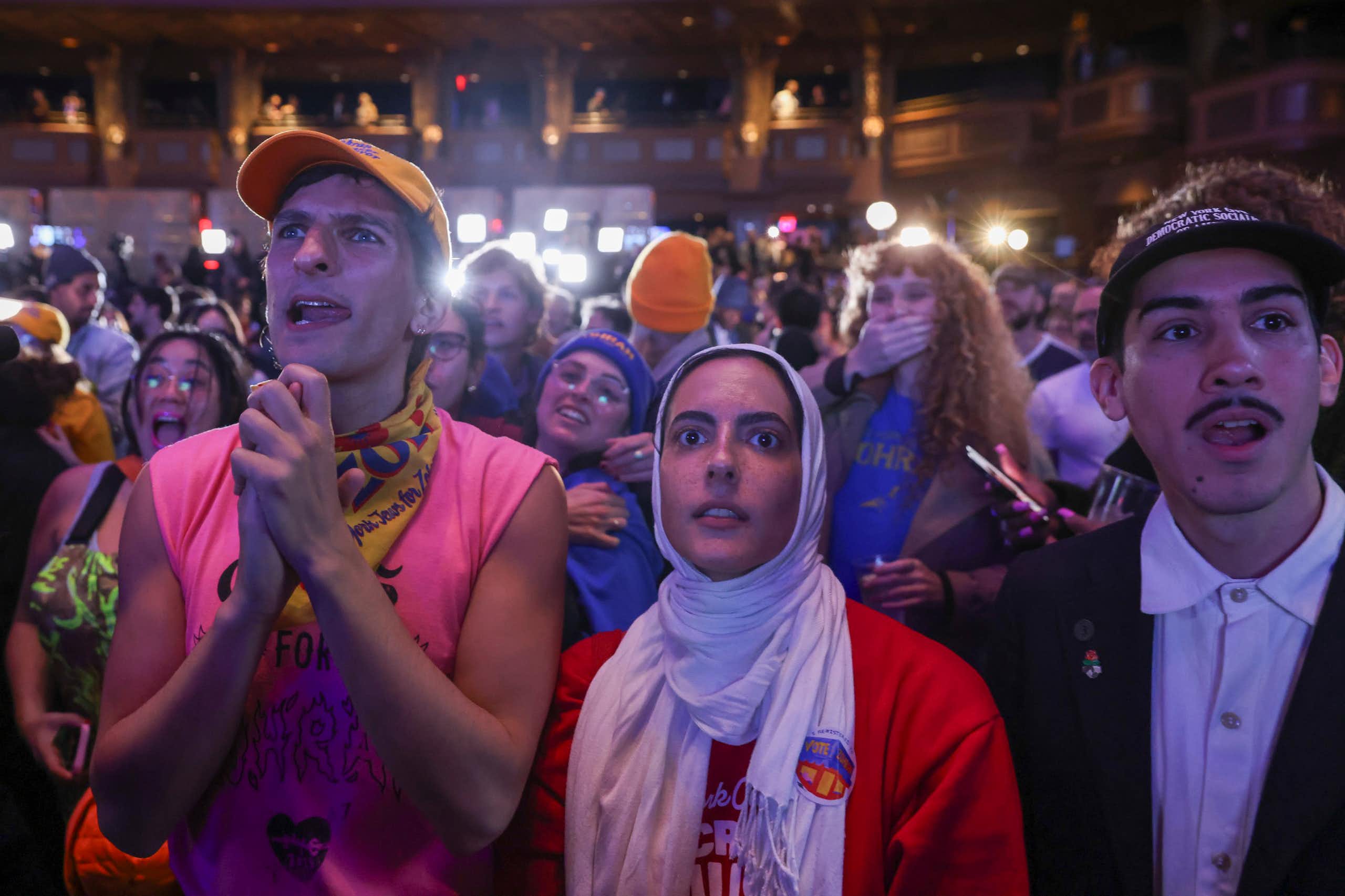 Supporters of Zohran Mamdani watch as the results of the New York City mayoral election are called.