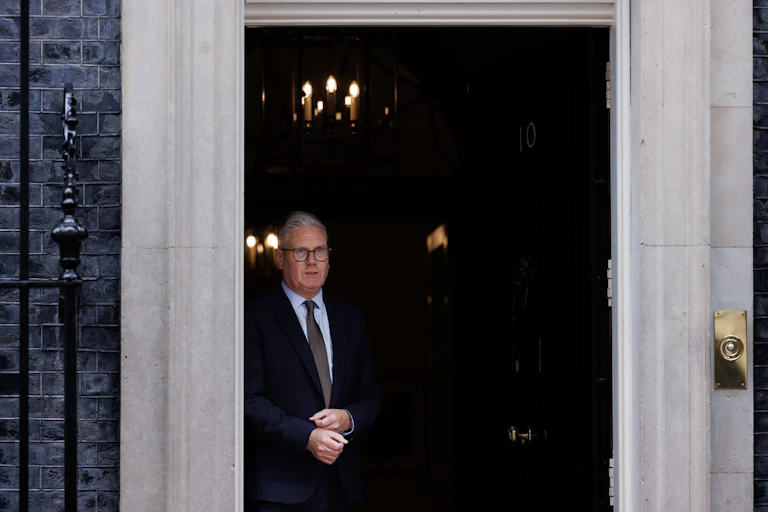 Keir Starmer walking out of 10 Downing Street.