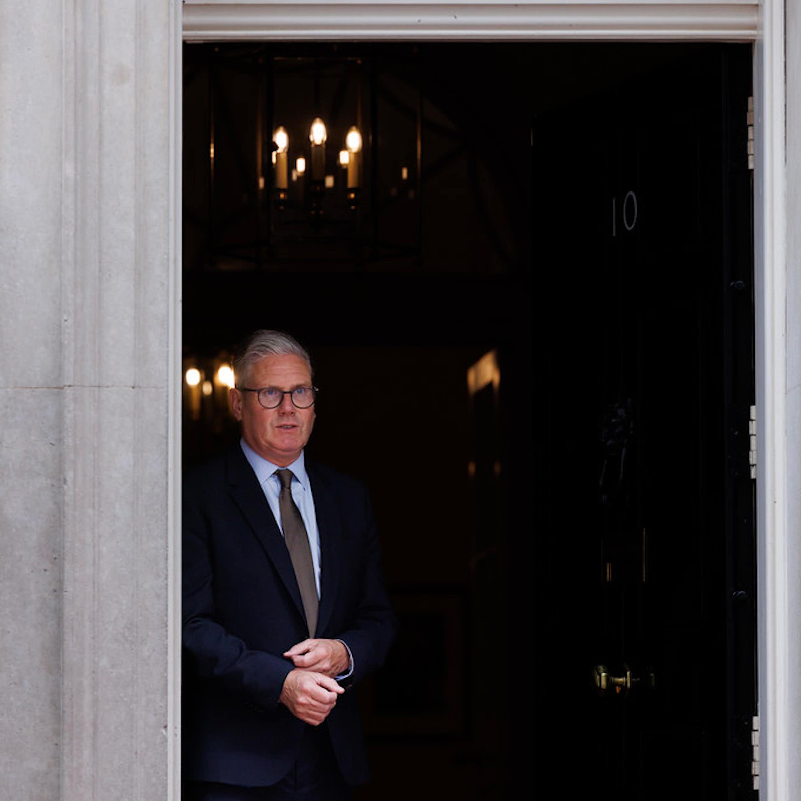 Keir Starmer walking out of 10 Downing Street.