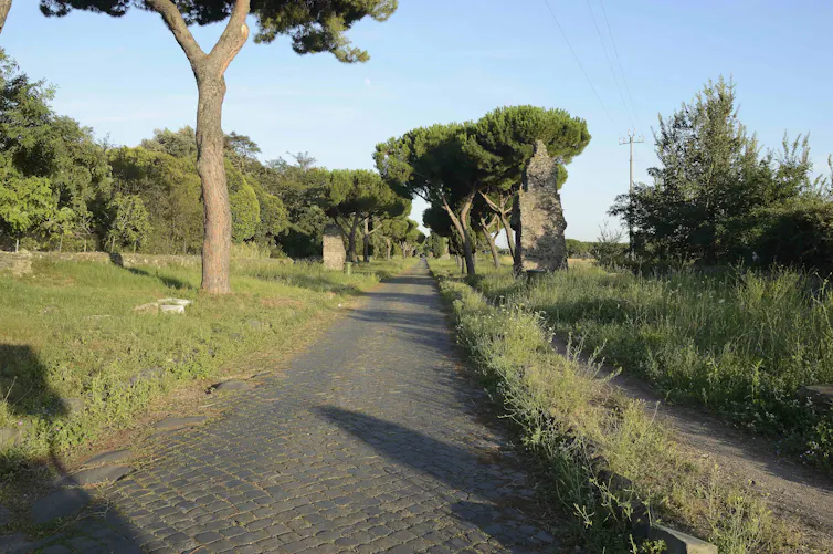 A paved road stretching into the distance.
