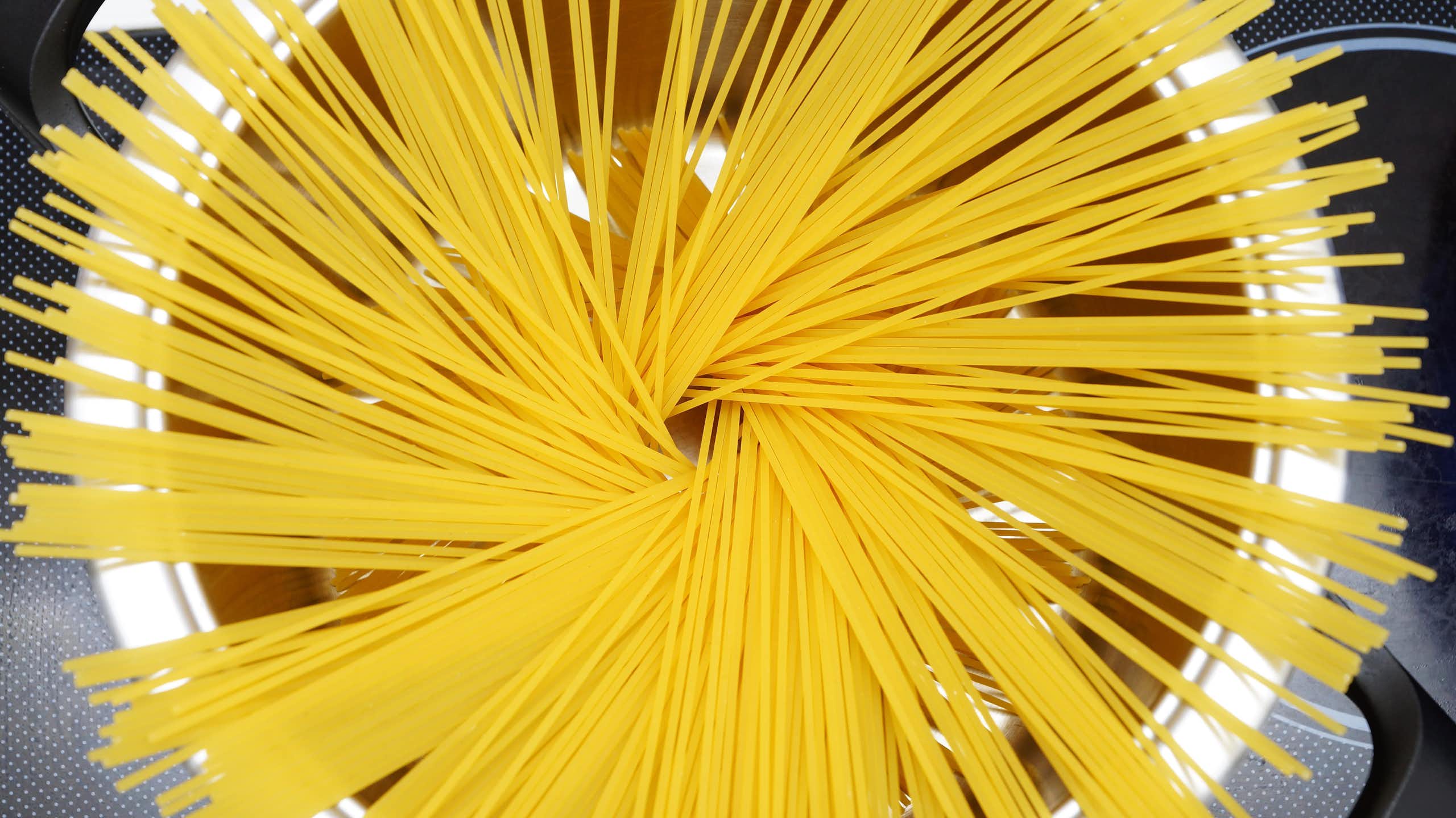 Spaghetti in a cooking pot.