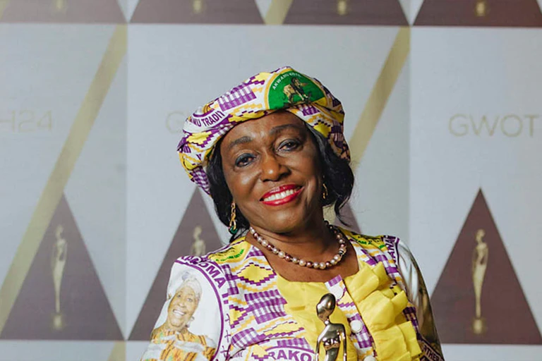 Head and shoulders of a smiling woman