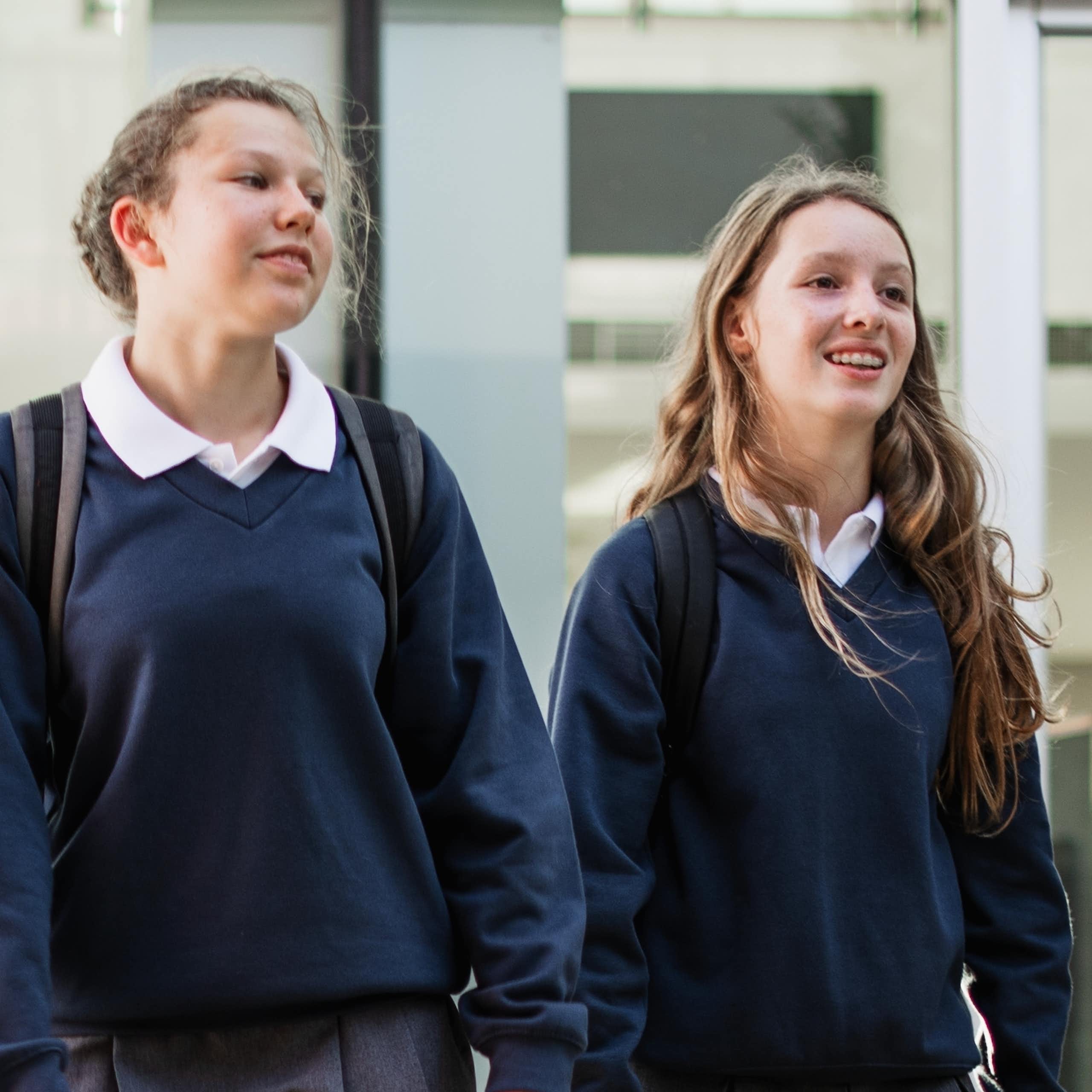 School pupils in uniform outside school