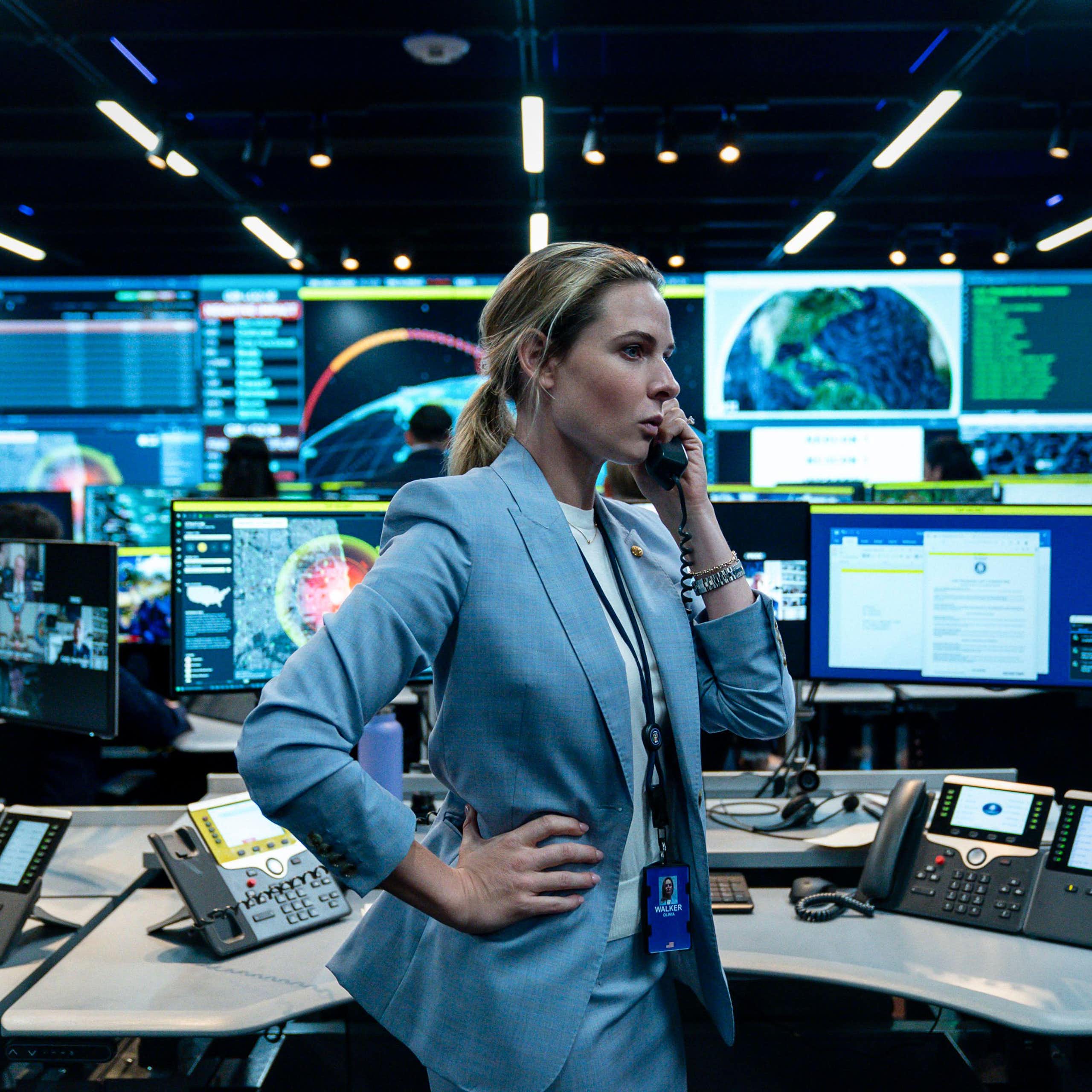 Still image from House of Dynamite showing staff reacting to a nuclear crisis.