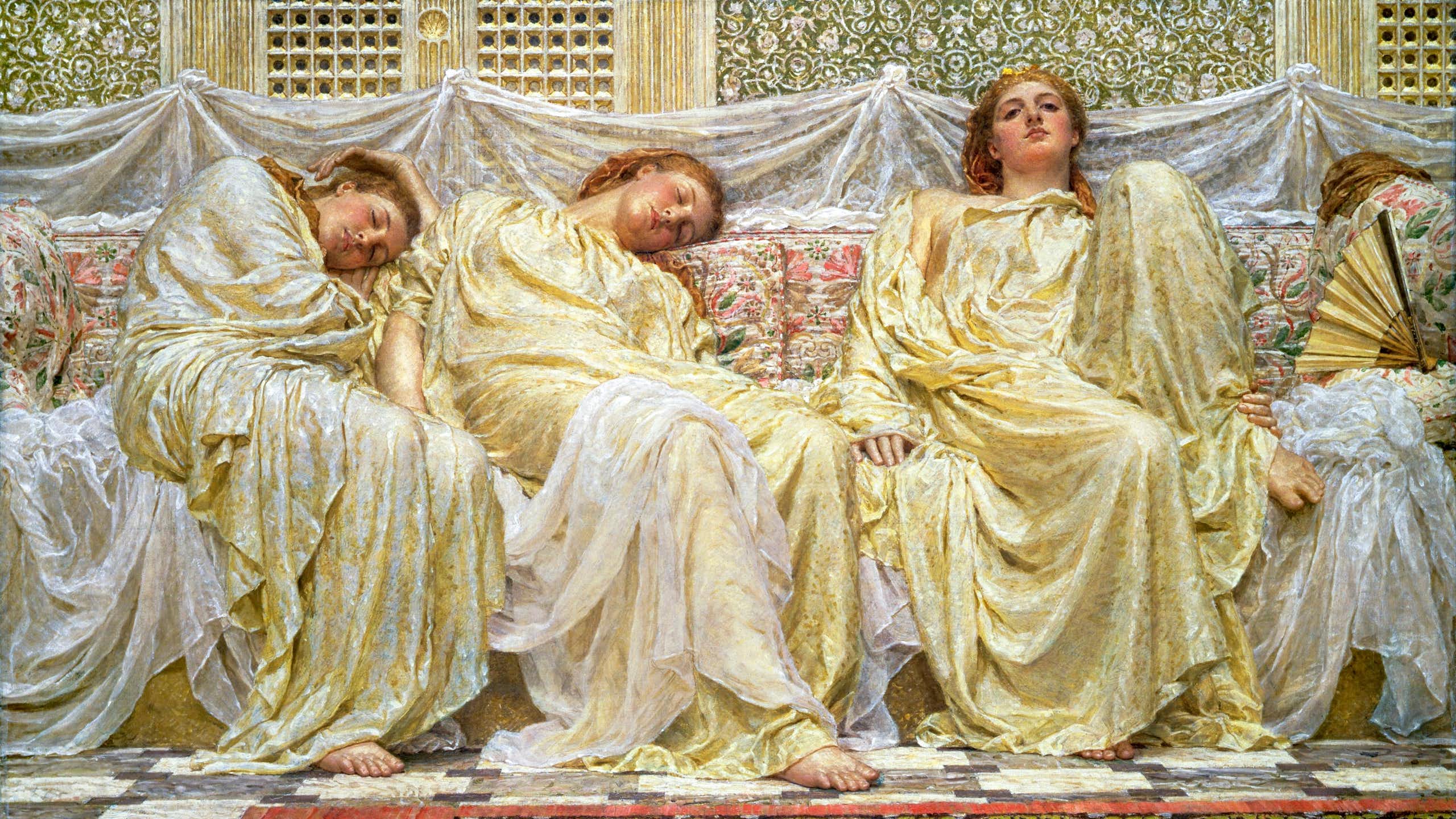 Mulheres dormindo em um sofá