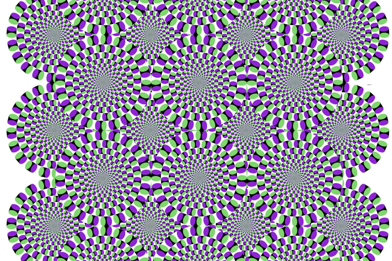 Several circles made of smaller ovals arranged in a grid, in a way that looks like they're slowly rotating.