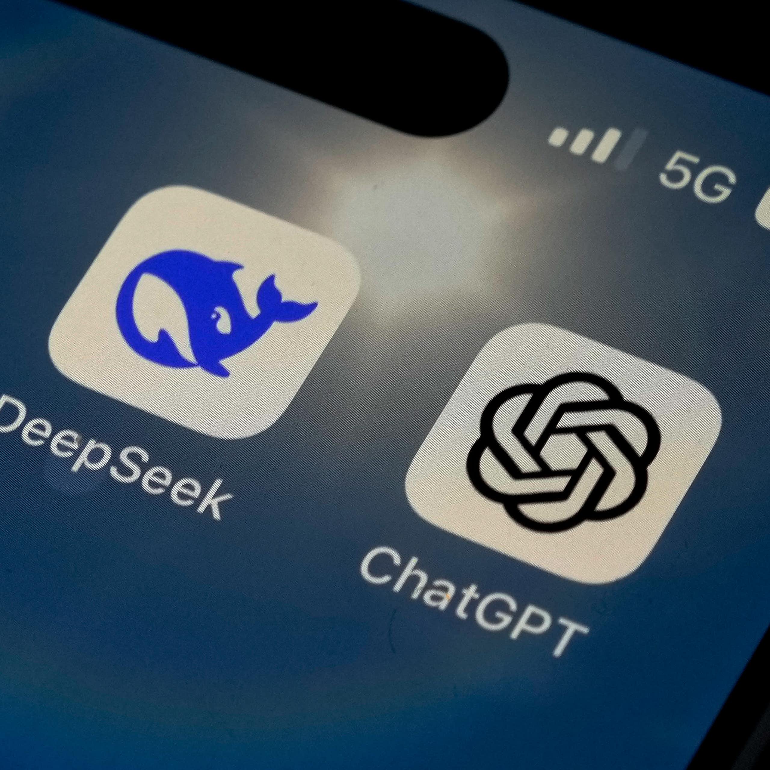 The icons for the smartphone apps DeepSeek and ChatGPT are seen on a smartphone screen