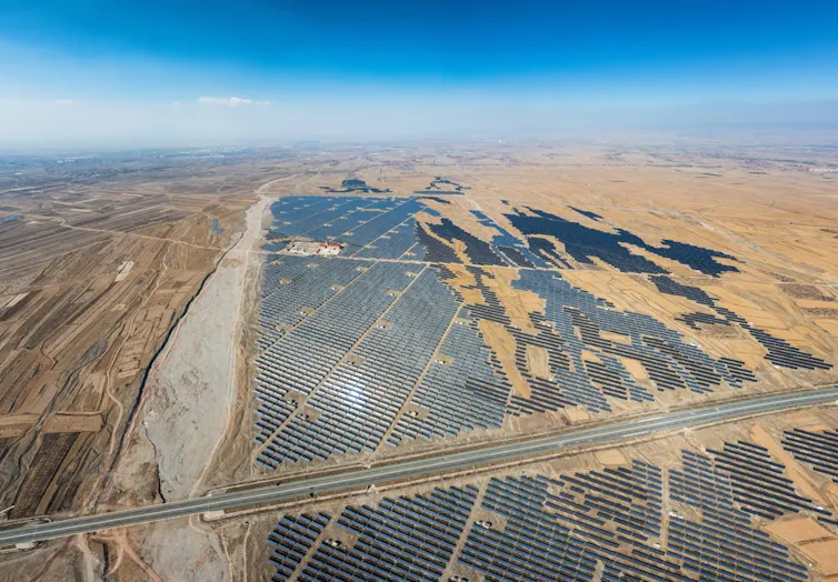aerial view of solar farm in dry landscape