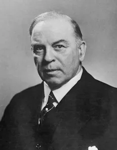 A black and white photo of a middle-aged white man