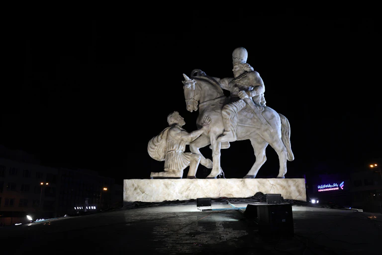 A new statue titled 'Kneeling Before Iran' is unveiled at the Enghelab Square, in Tehran, Iran, 07 November 2025