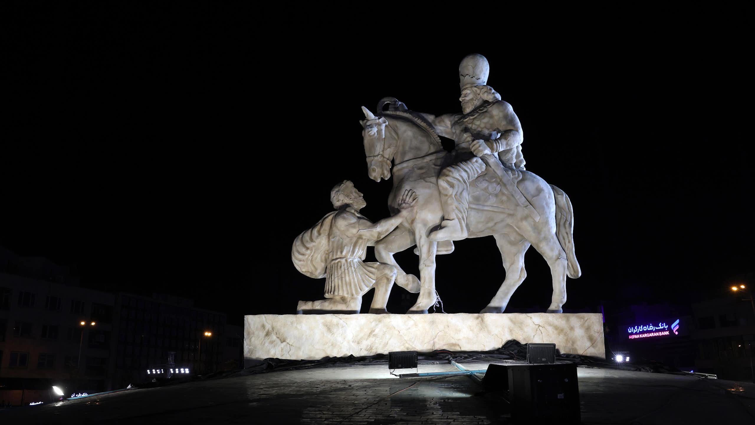 A new statue titled 'Kneeling Before Iran' is unveiled at the Enghelab Square, in Tehran, Iran, 07 November 2025