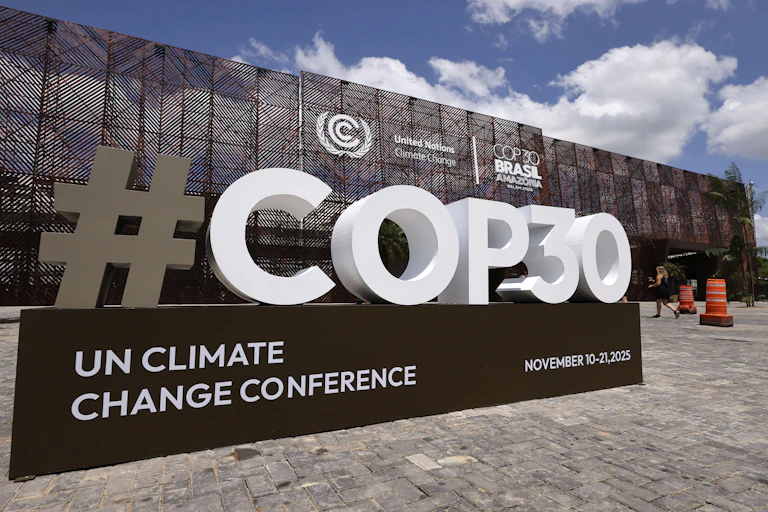 The COP30 logo is seen in front of the central building at the COP30 Brazil Amazonia 2025 meeting in Belem, Brazil.