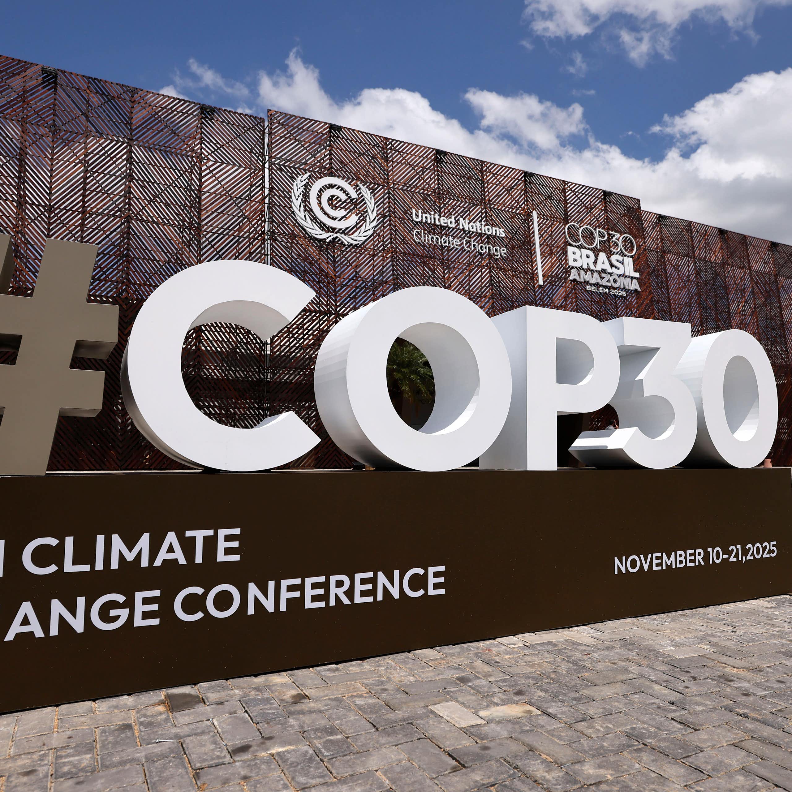 The COP30 logo is seen in front of the central building at the COP30 Brazil Amazonia 2025 meeting in Belem, Brazil.