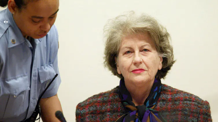 Plavsic stares resolutely in the courtroom.