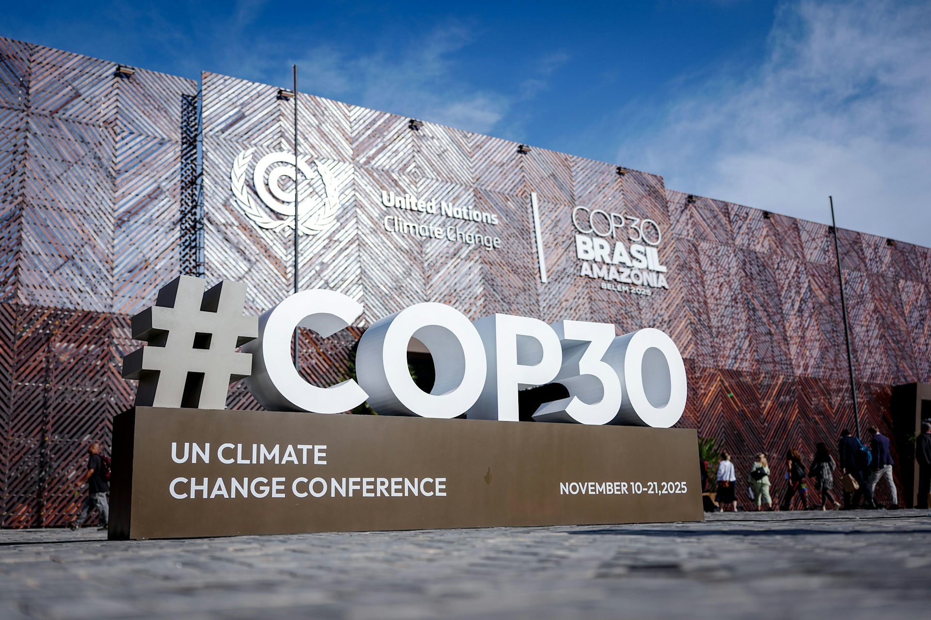 large '#cop30' sign outside building