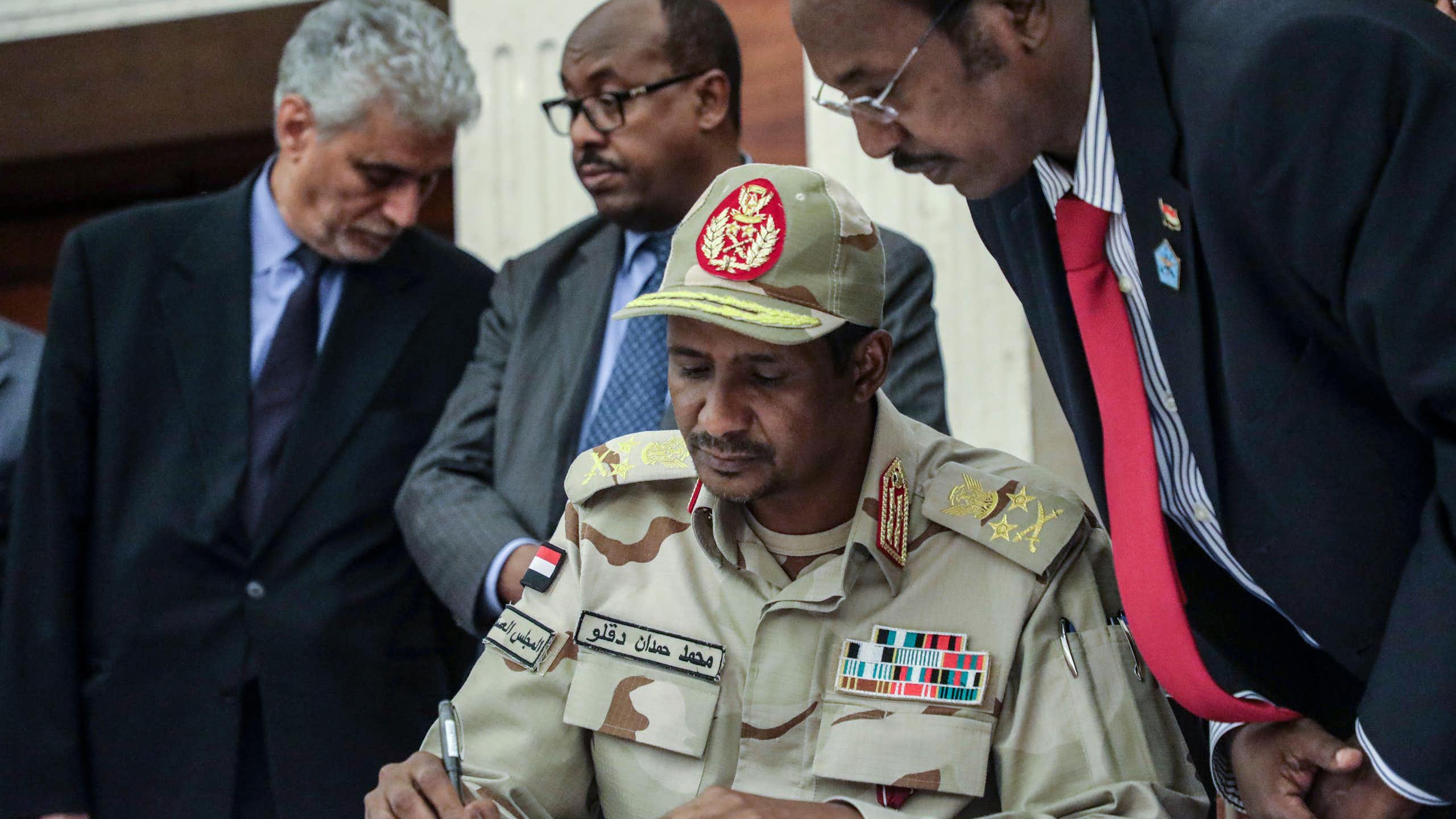 RSF leader, Mohammed Hamdan Dagalo, known as Hemedti, signs a power-sharing agrteement, 2019.
