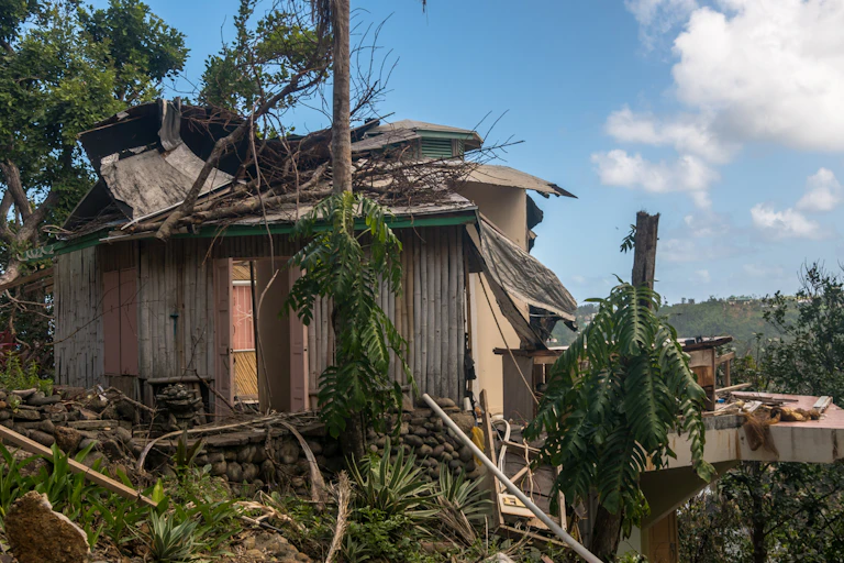 tropical island hurricane damage on buildings