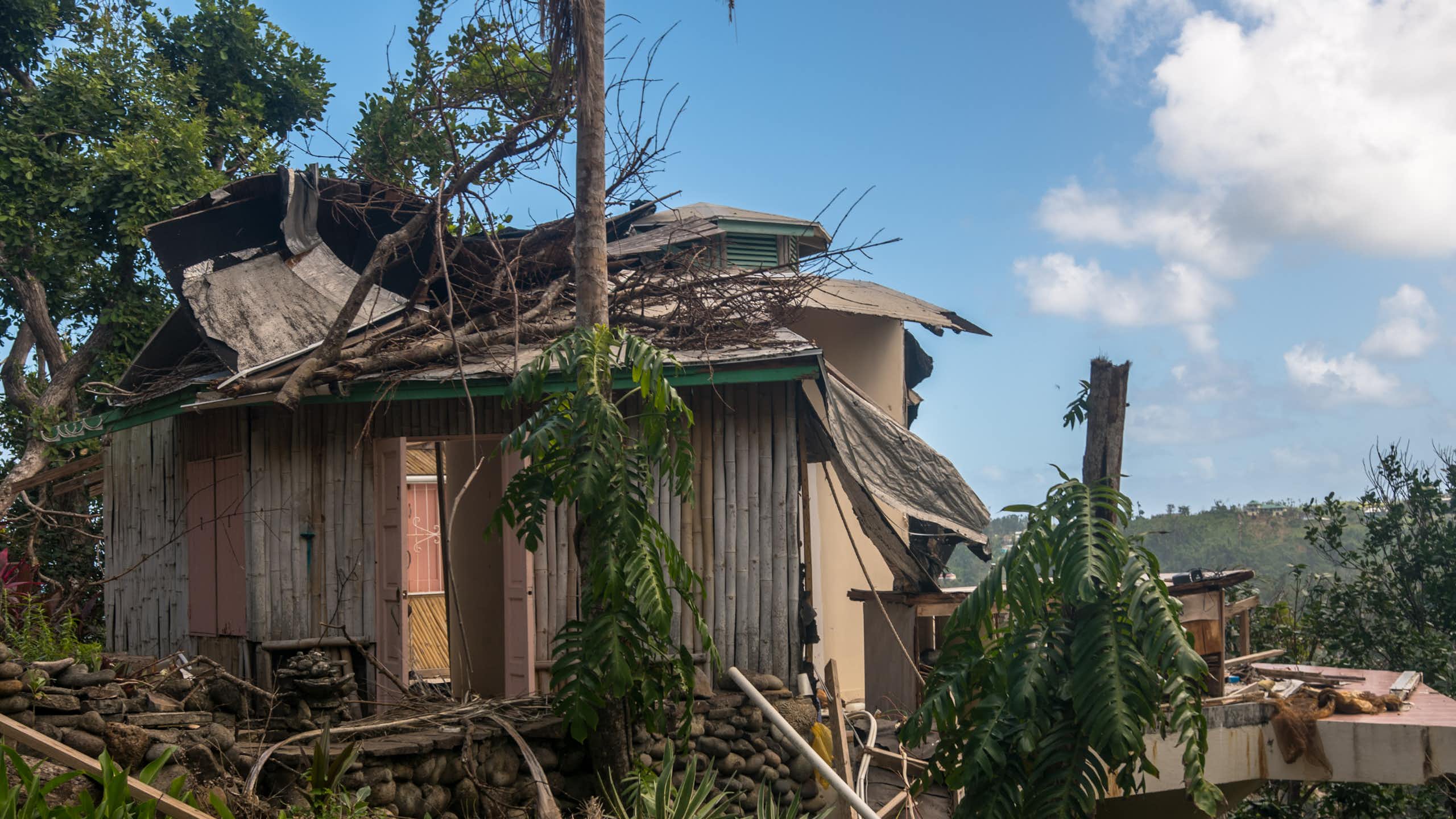 tropical island hurricane damage on buildings