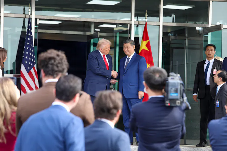 President Xi and President Trump shake hands