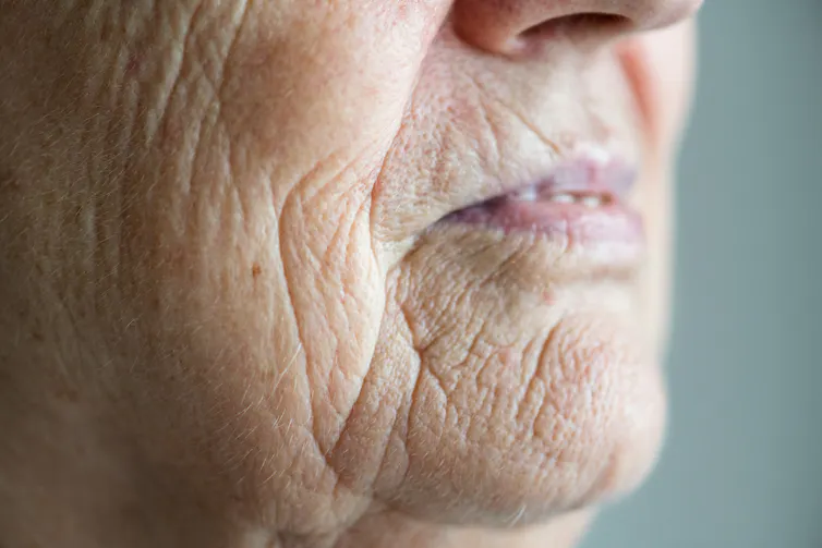 Closeup image of the lower half of an older person's face