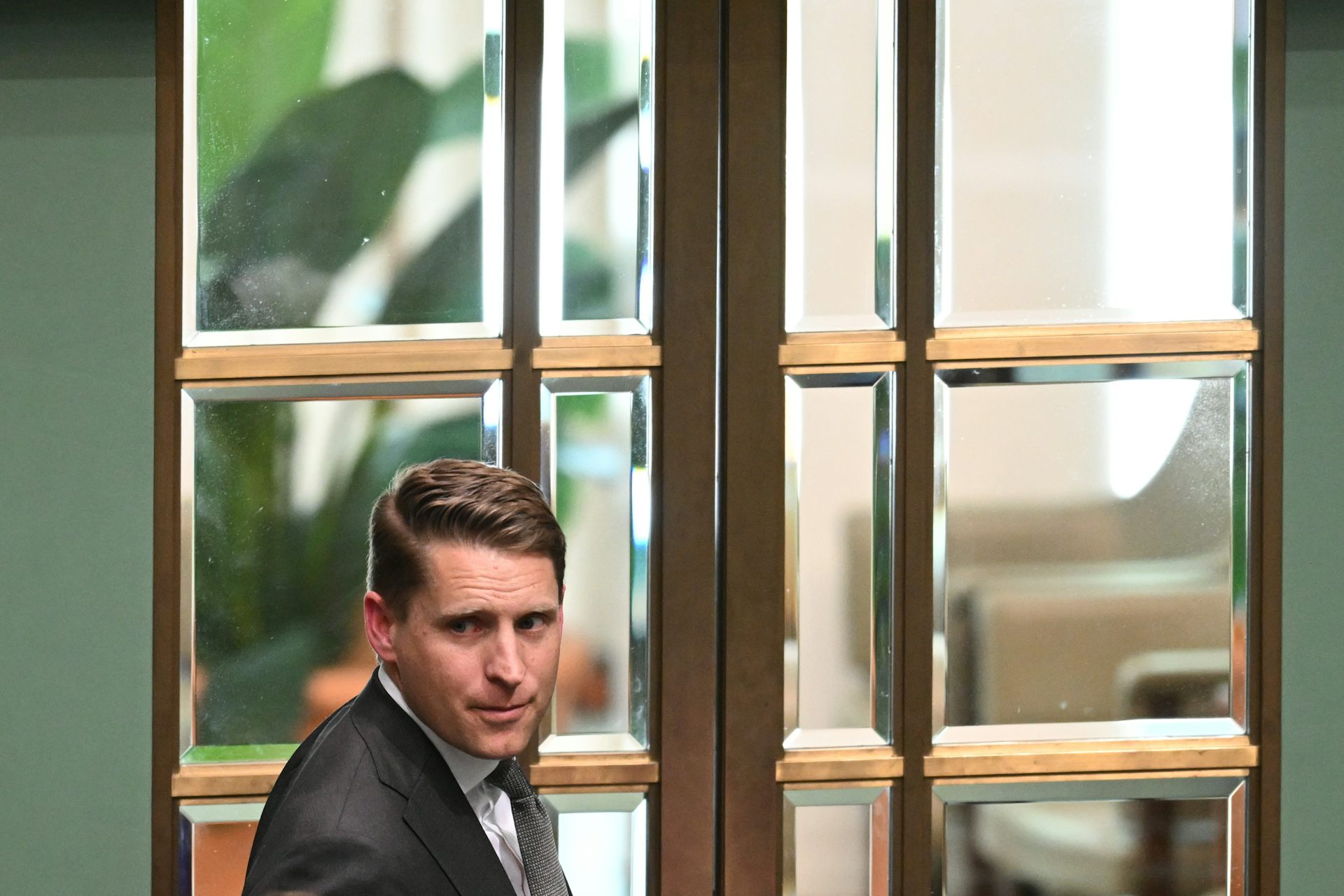 Andrew Hastie leaves during Question Time at Parliament House.